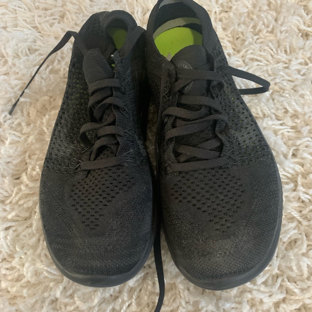 Used Women’s Nike Free RN Flyknit, size 8